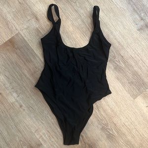 Black high leg cut one piece swimsuit